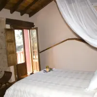 Casa Rural Ginkgos Dormitorio Toscana con balcón verato